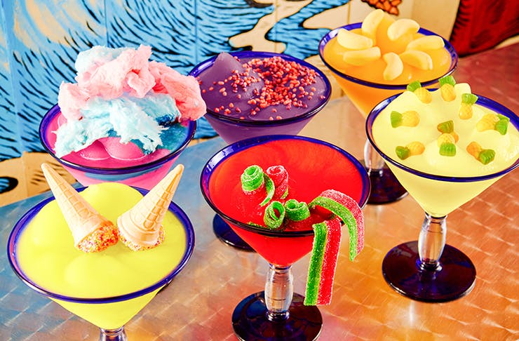 Brightly coloured frozen margaritas 
