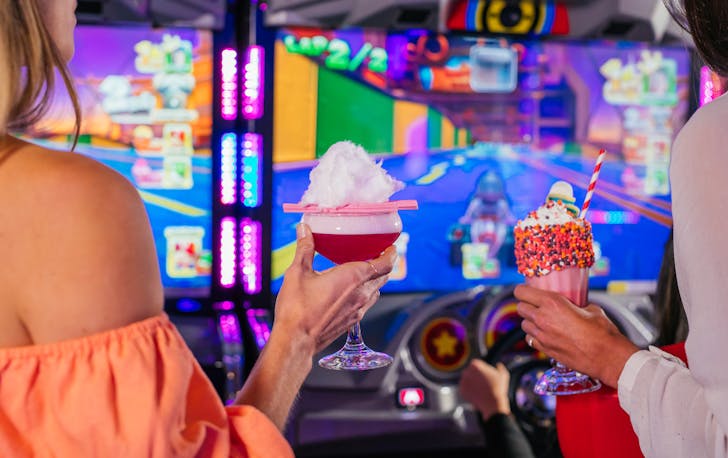 Hands holding cocktails