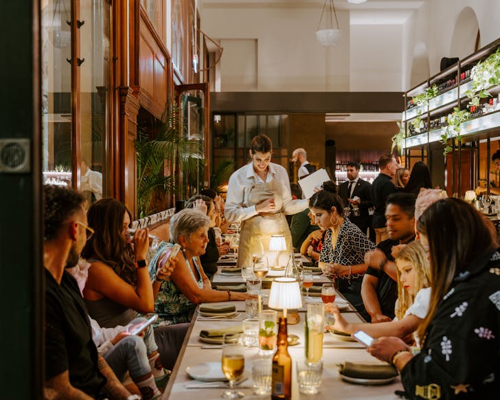 a waitress takes orders at Morena, a new restaurant in Sydney