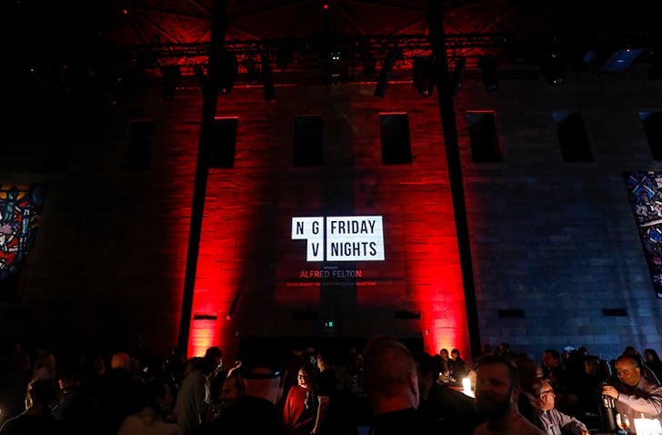 A large dancefloor with red light, one of the best dates Melbourne. 