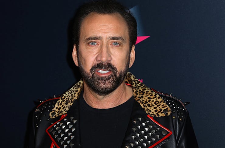 Nicolas Cage in leather jacket lined with faux animal fur.