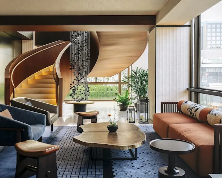 A modernist, warm Japanese-inspired room at Nobu Hotel Barcelona. 
