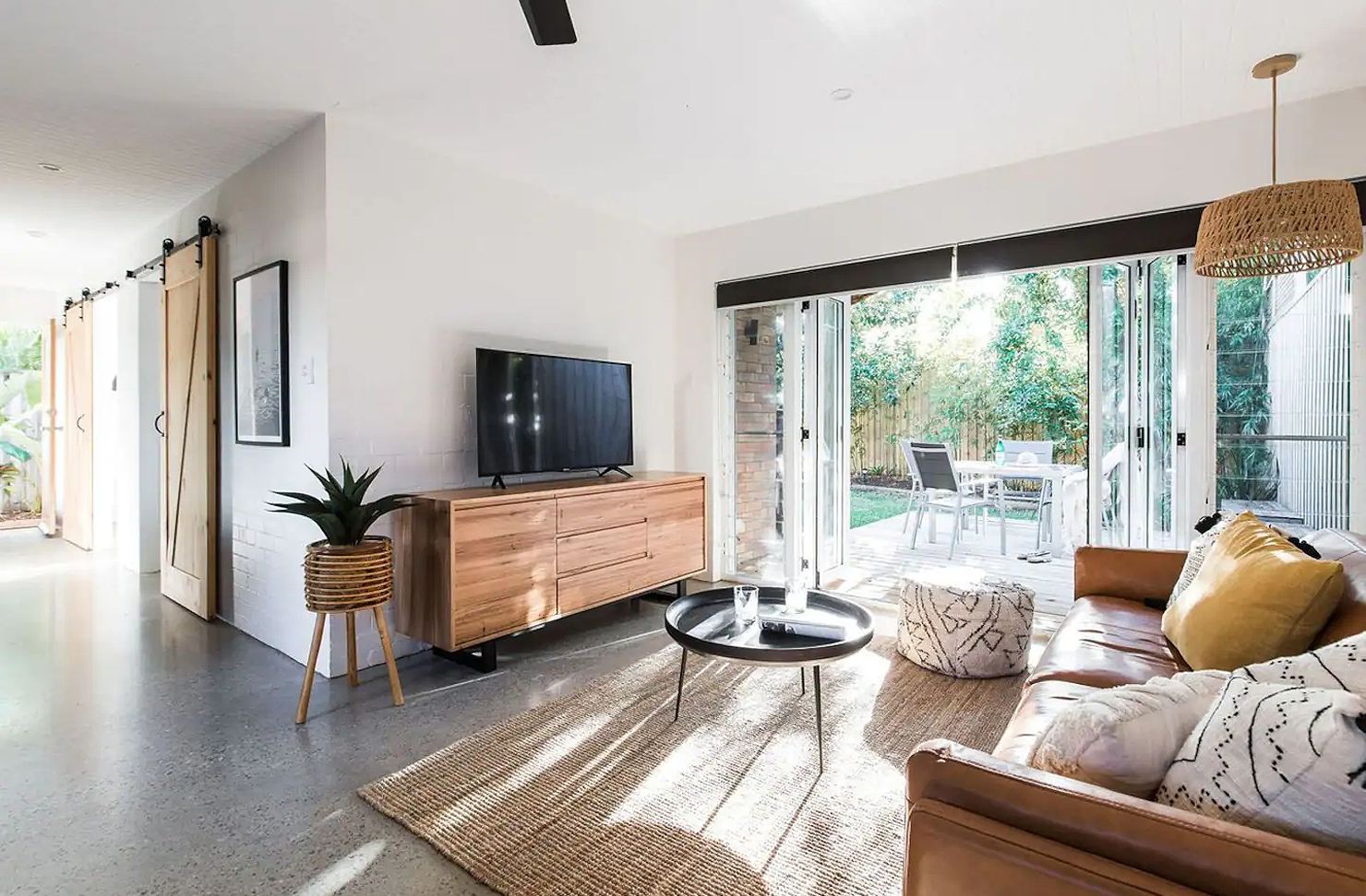 a white indoor-outdoor lounge room