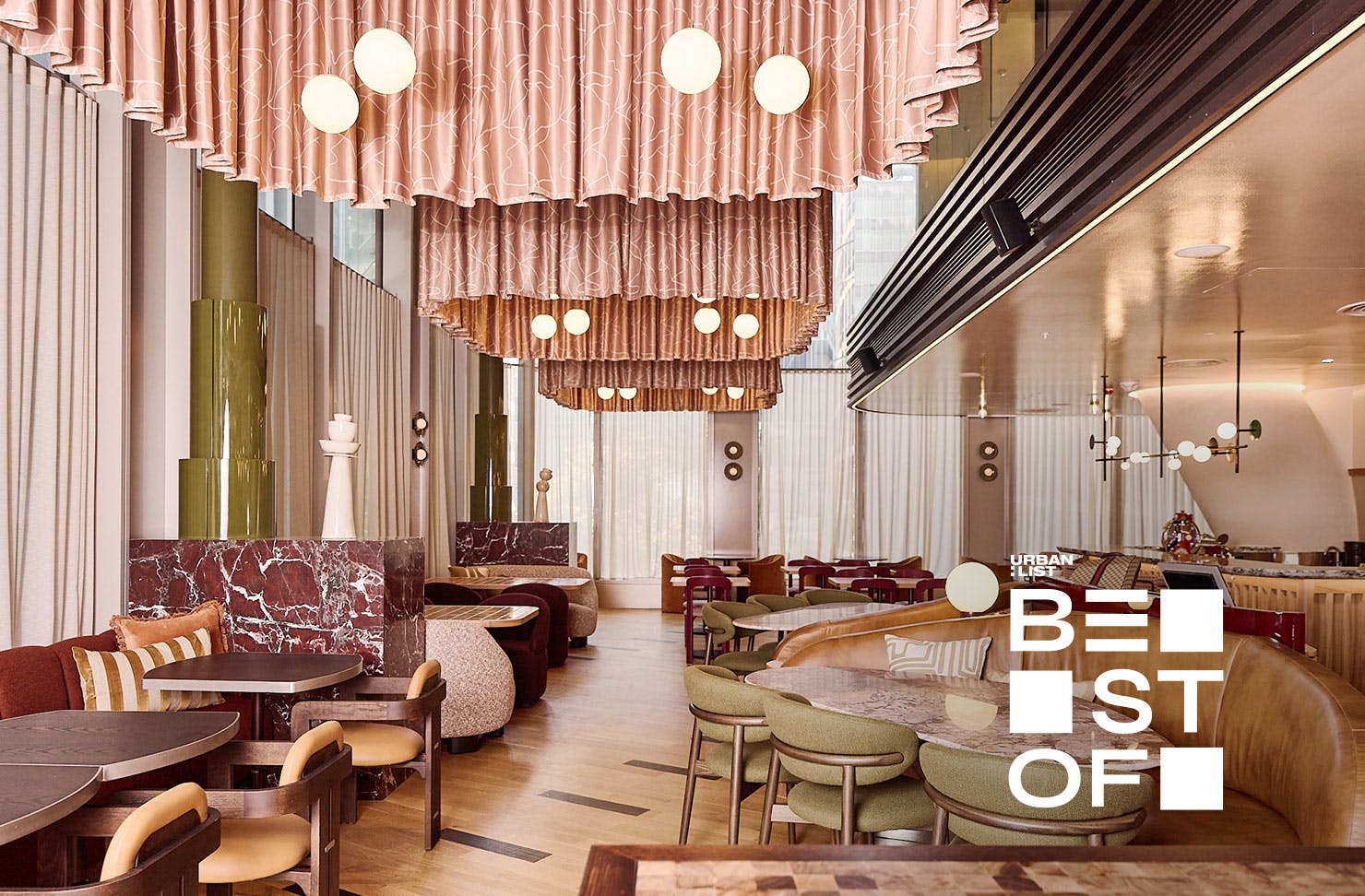 The pink hued dining room at Bar Lettera, one of the best restaurants in North Sydney