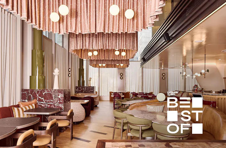 The pink hued dining room at Bar Lettera, one of the best restaurants in North Sydney