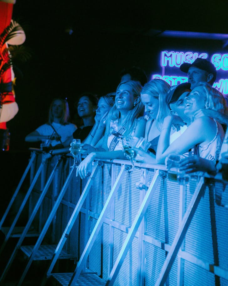 People line up at the barricade of the Back Room in the Northern Byron Bay