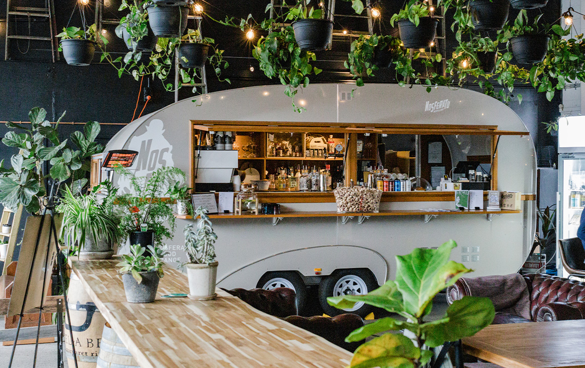 a retro style caravan bar inside a warehouse