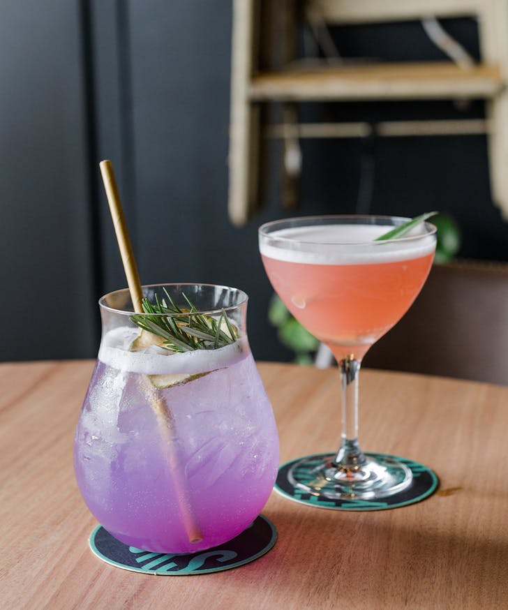 two cocktails on a table