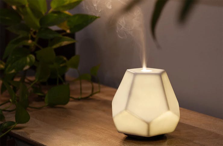 Oil diffuser sprays sweetly into the room.