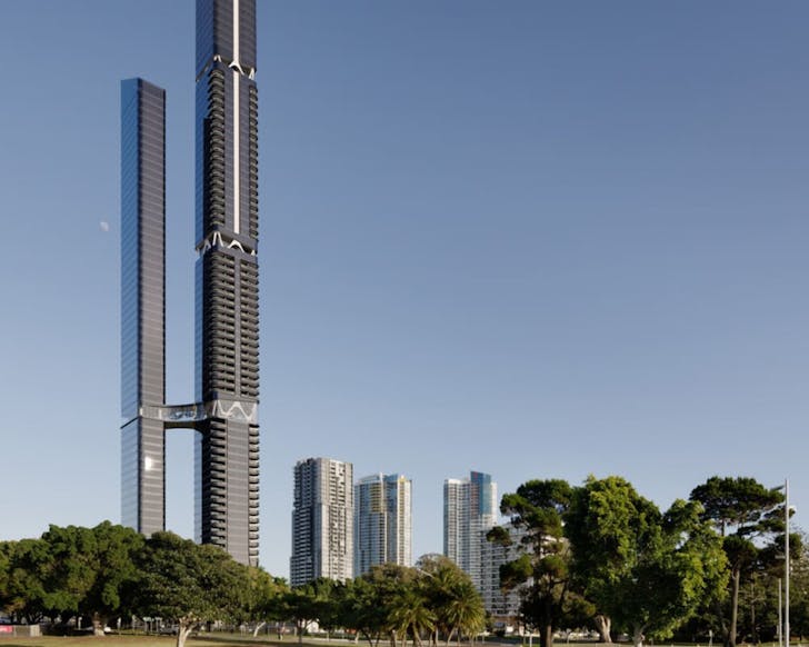 Tall twin skyscrapers of the 1 Park Lane development rising above Southportâs skyline, viewed from the park with trees and open green space in the foreground.