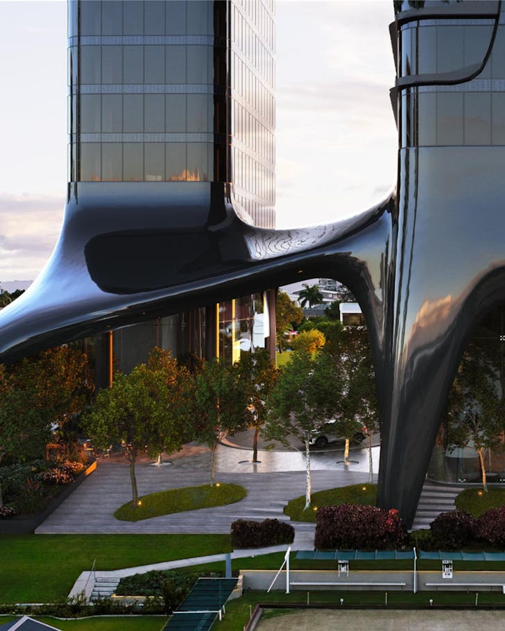 Ground-level view of futuristic twin towers with sculptural black curved architecture and landscaped garden spaces at 1 Park Lane, Southport.