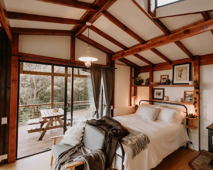 A view of the bedroom at Orsini's Rainforest Retreat romantic Airbnb near Brisbane