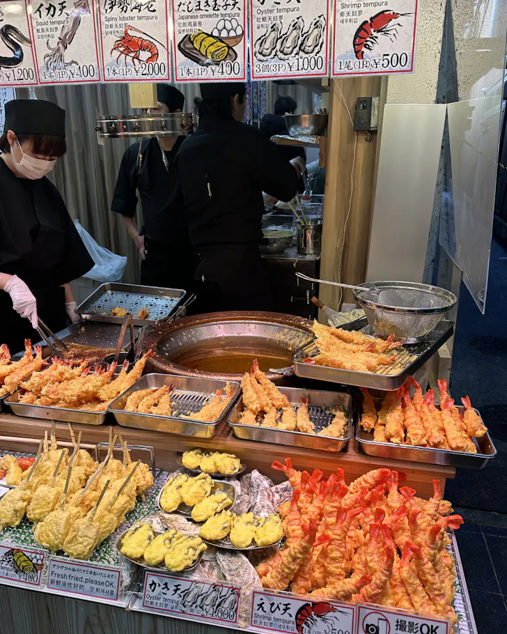 A tempura stall at Kuromon Ichiba Market in Osaka.
