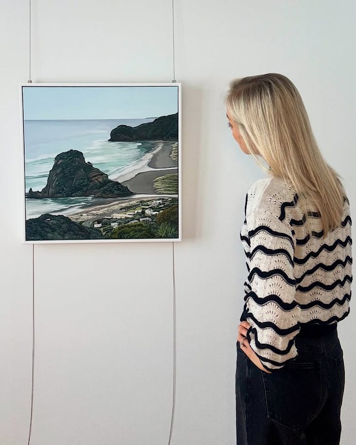 Artist Judith Milner gazes at her âPride of Pihaâ work from the Our Backyard Collection.