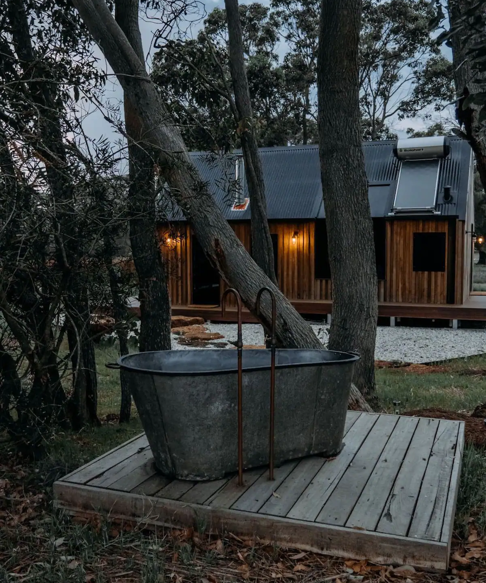 A rustic outdoor bath tub