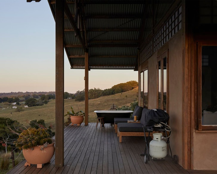 The outdoor bath on the deck of Skyfarm Hemp Villa Airbnb near Brisbane Queensland
