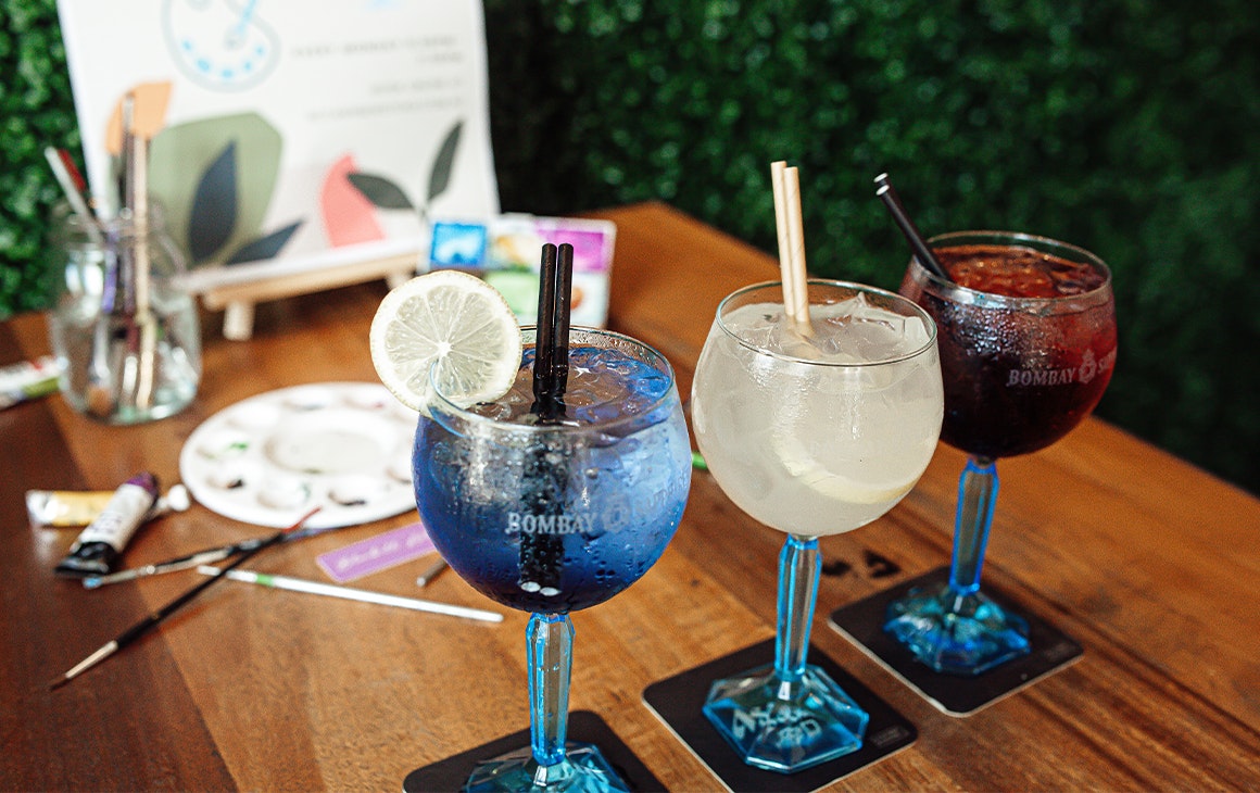 three cocktails on a table