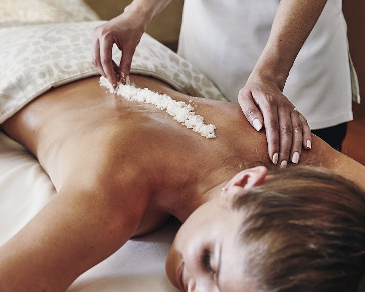 A woman is treated to a lovely spa treatment at the Park Hyatt.