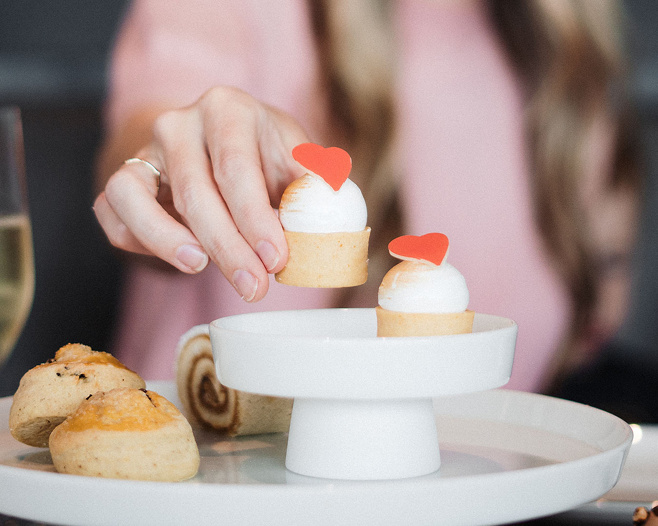 Someone picks up a treat at Park Hyatt's special mother's day afternoon tea.
