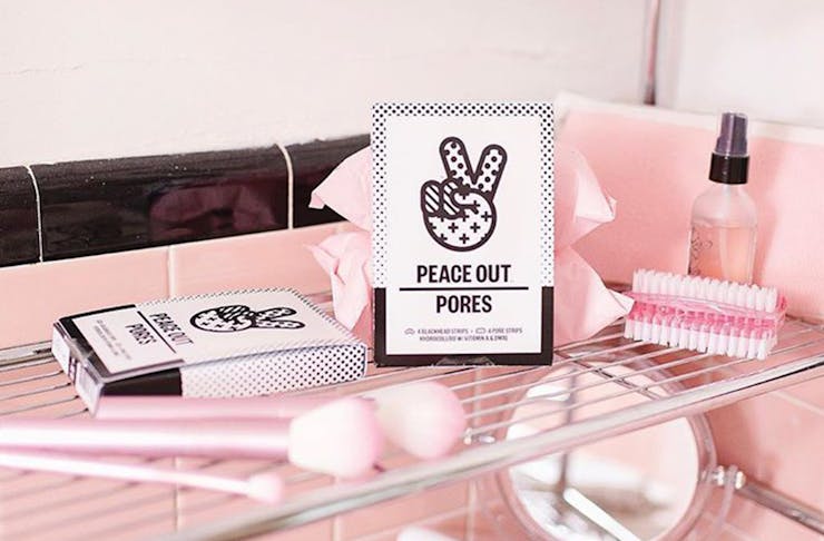 Peace Out products on a shelf with other beauty products.
