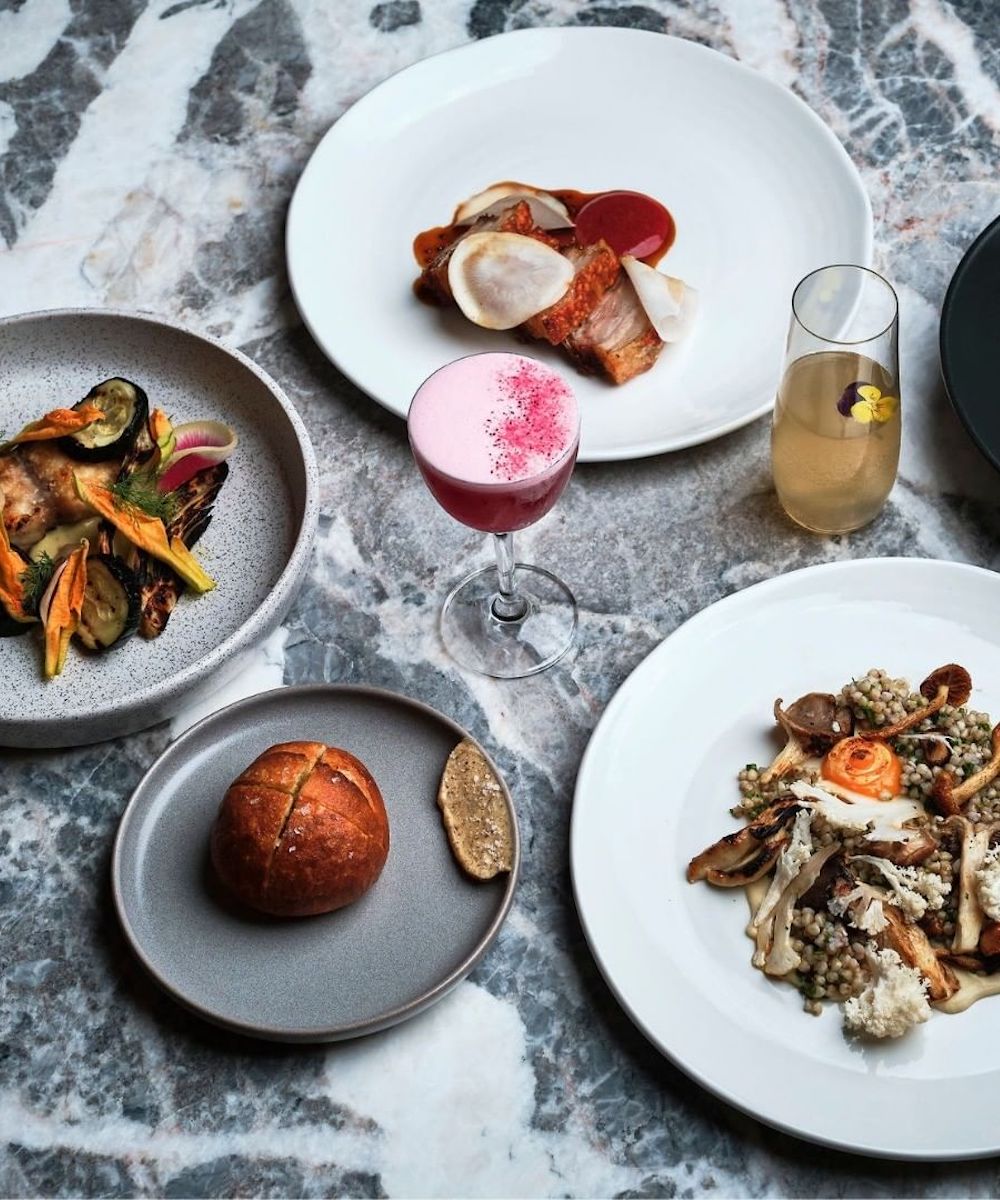 A table filled with beautiful dishes at Any Dining in Perth's CBD