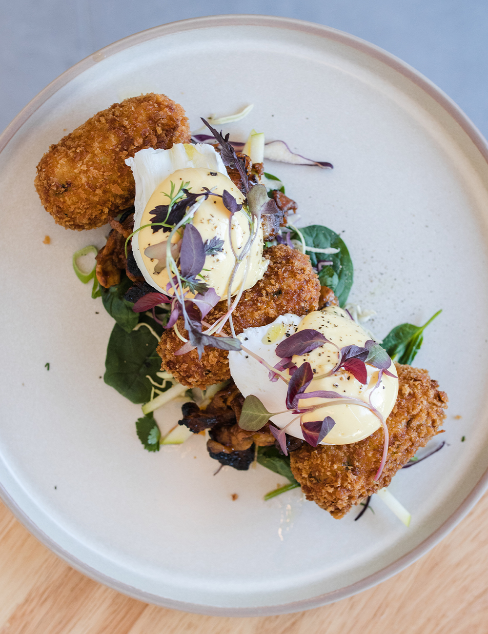 breakfast with croquettes and poached eggs