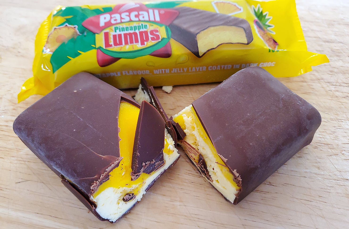 A pineapple lump ice cream bar cracked open for your viewing pleasure.