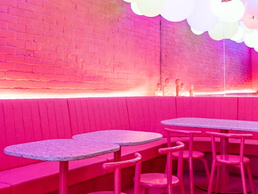 An all pink restaurant interior 