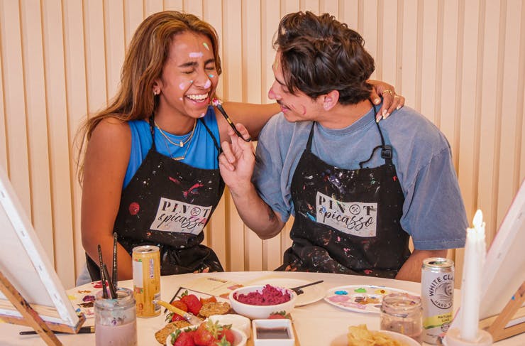 A couple at Pinot Picasso paint and sip