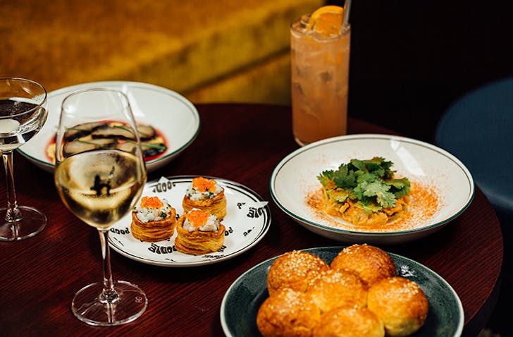 A selection of lavish share plates on a table at Poodle, Fitzroy.