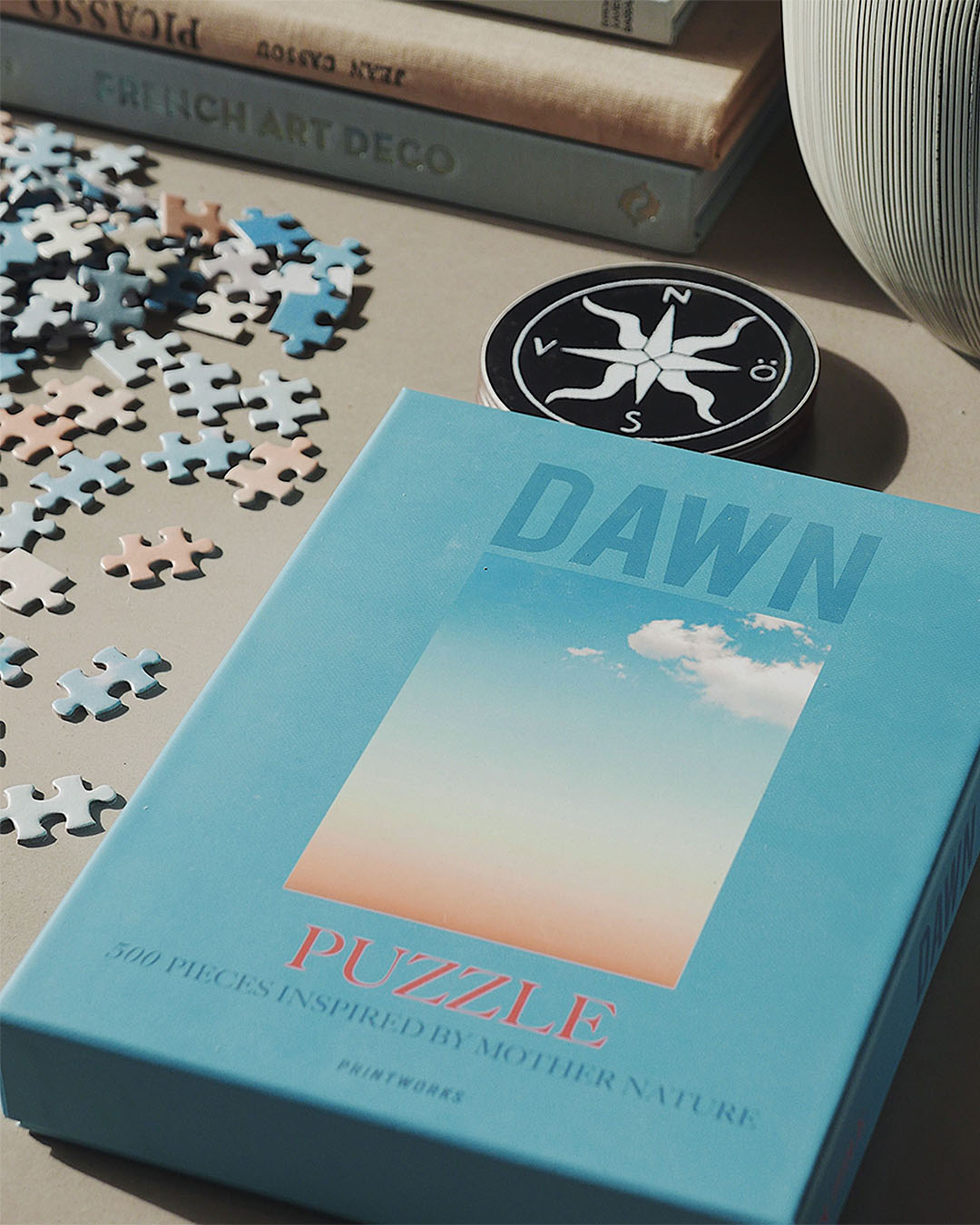A Printworks dawn puzzle on a table.