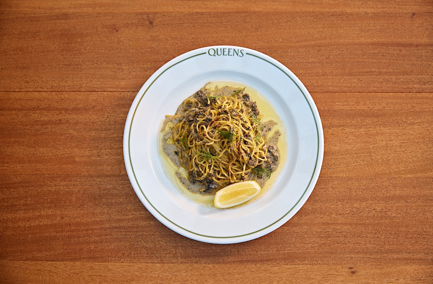 A Queens Matariki Special Pasta: hand-rolled saffron fettuccine with South Island creamed pāua and shaved black truffle.