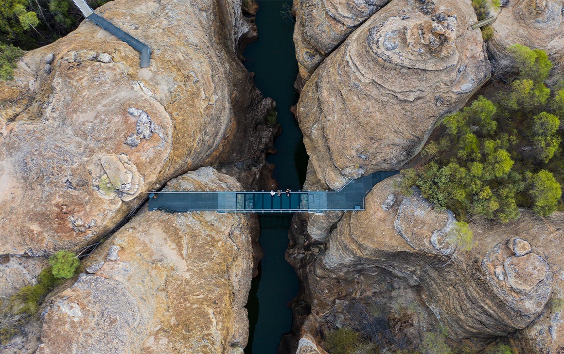 helicopter view over a deep water filled gorge