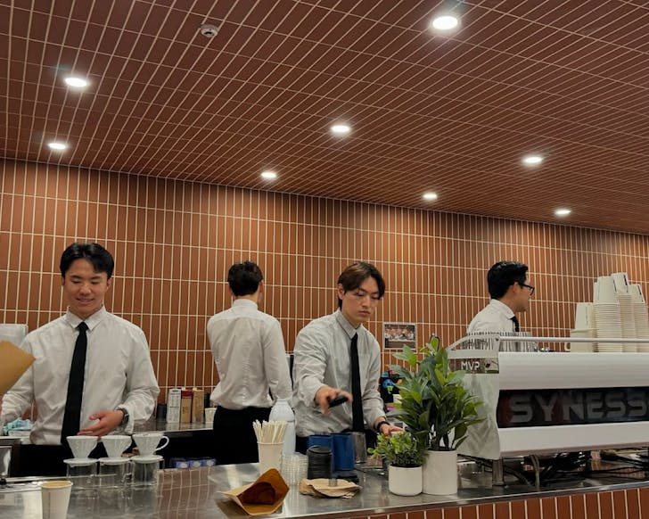 The smartly dressed Receptionist Cafe team hard at work.