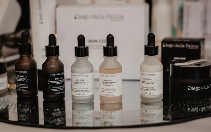 several glass bottles of serum