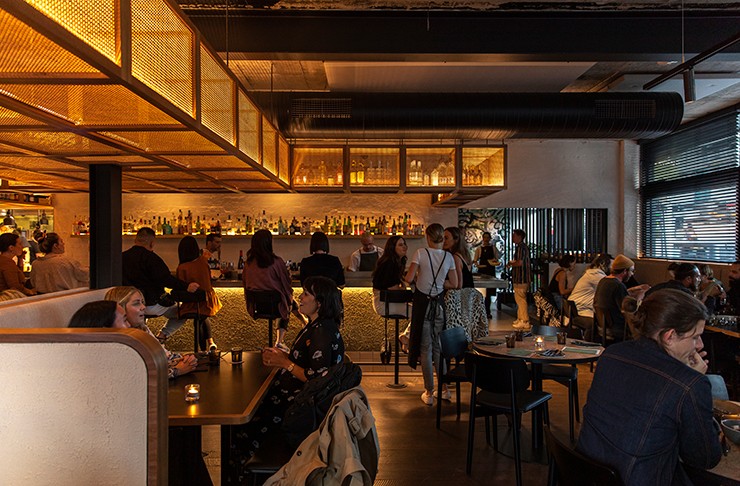 One of Melbourne's best restaurants with a sleek and modern, golden-lit interior.