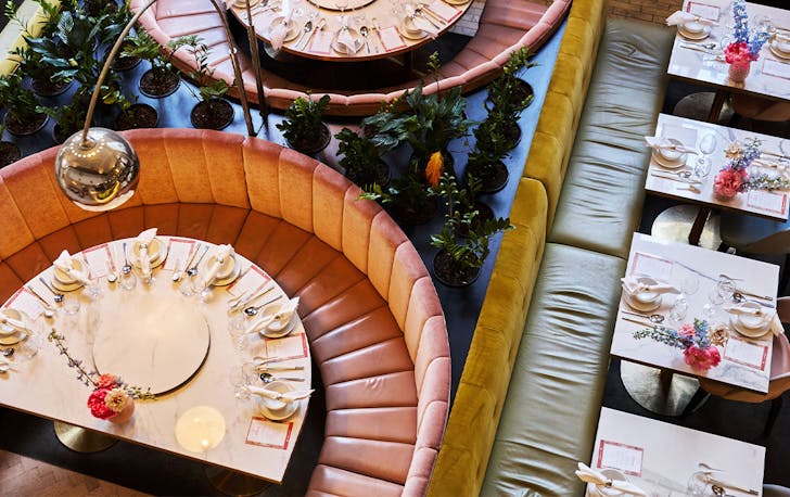 a large circular booth table in a restaurant
