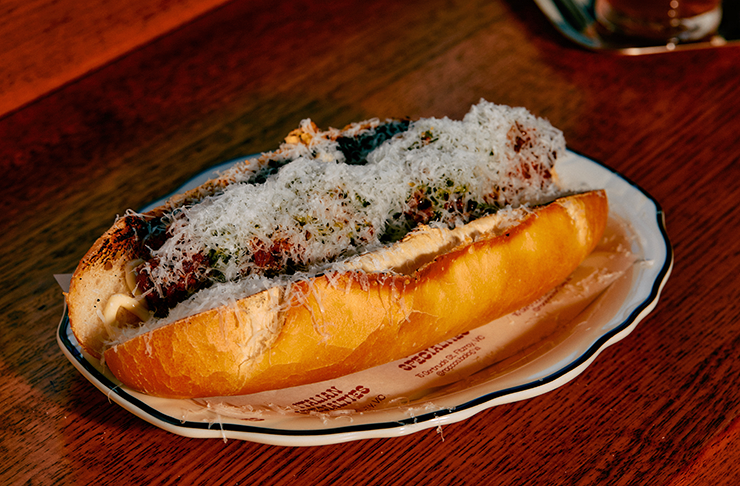 A hefty, parmesan covered meatball sub from Rocco's Bologna Discoteca, one of Melbourne's best Italian restaurants and bars.