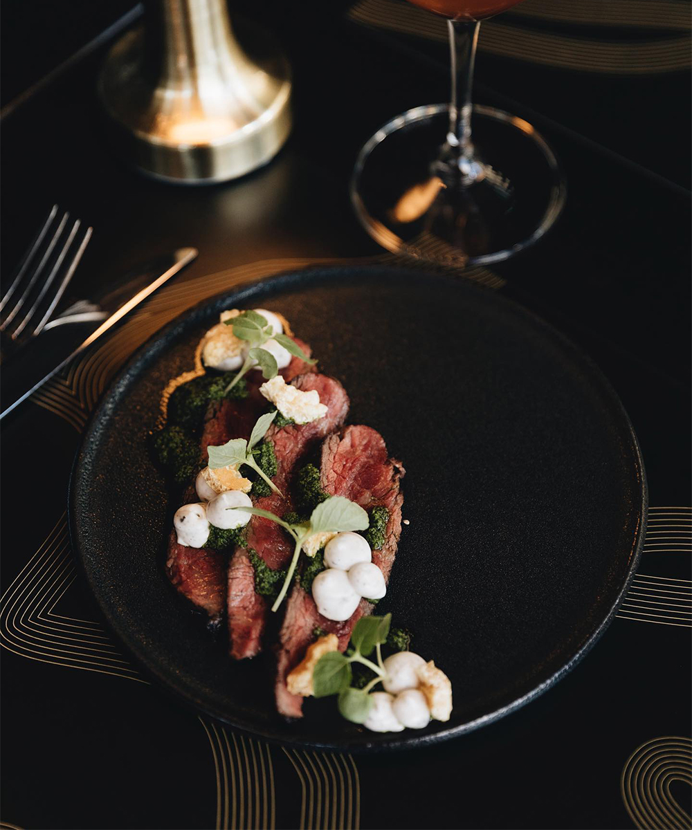 a plate of sliced steak