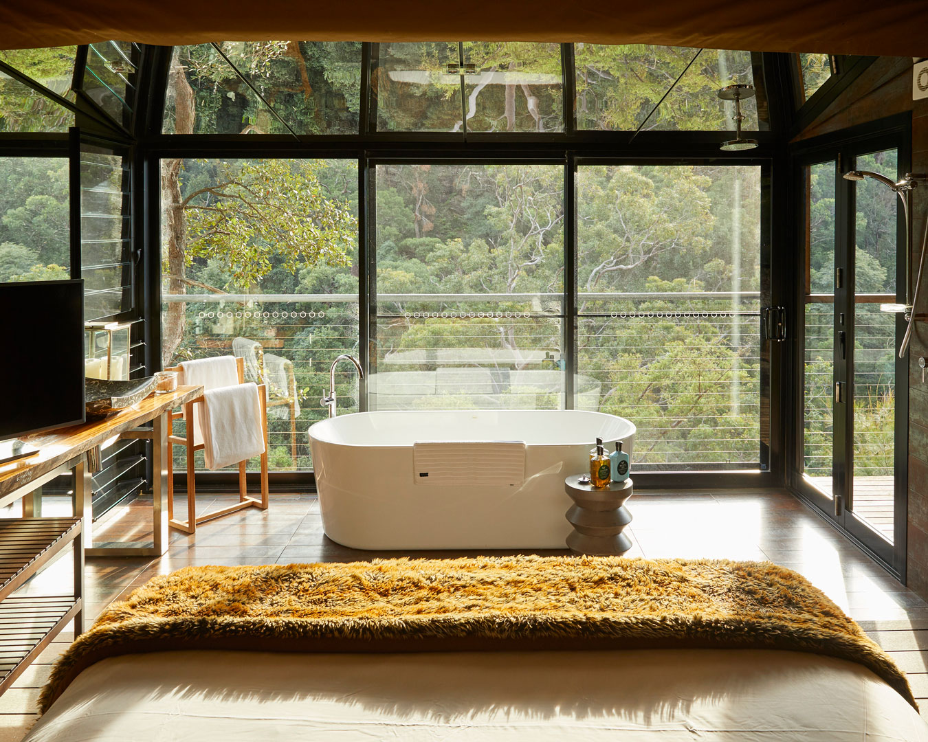 A bathtub overlooking bushland at Spicers Sangoma Retreat, one of the best romantic getaways in NSW