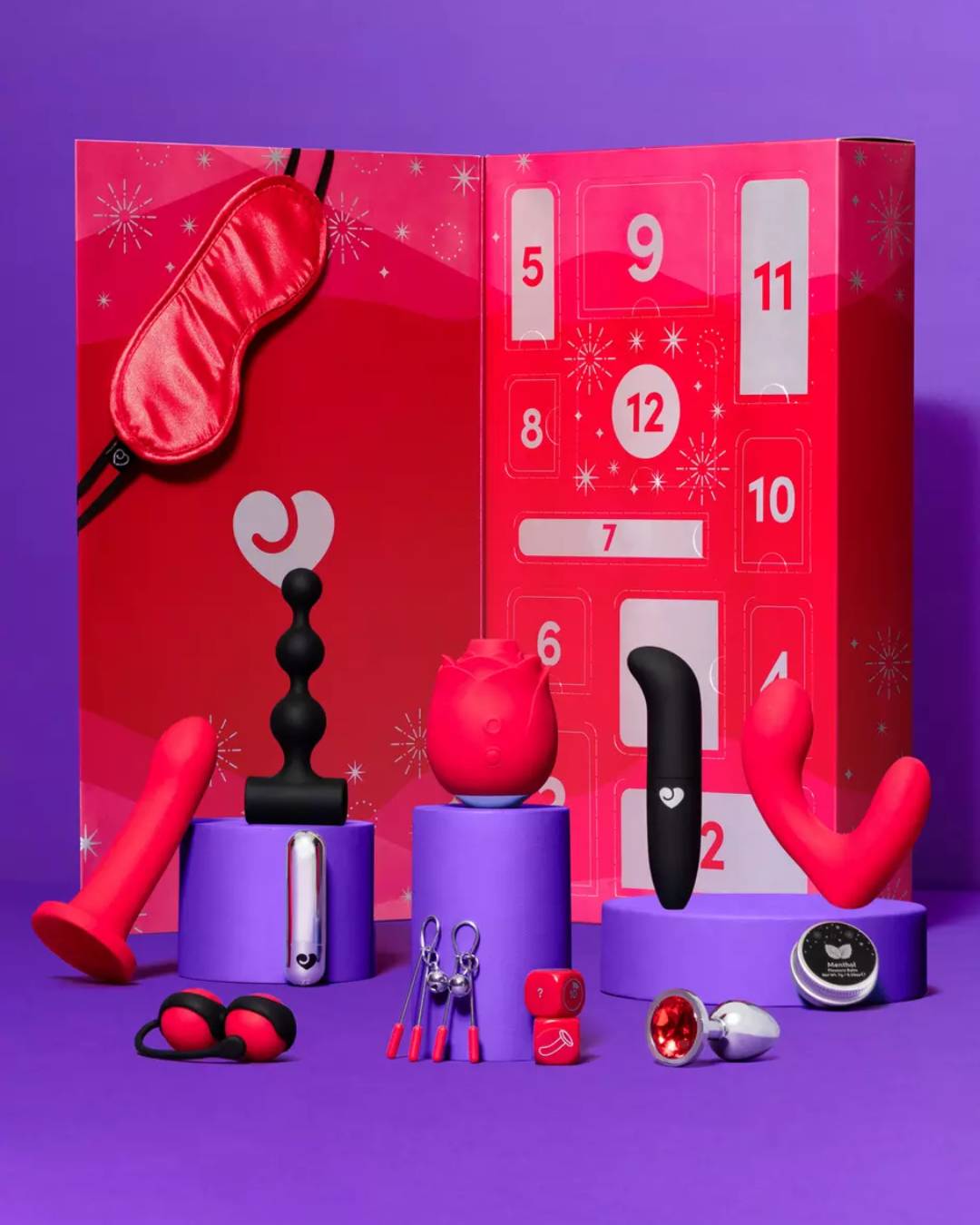 sex toy advent calendar in pink box on purple background