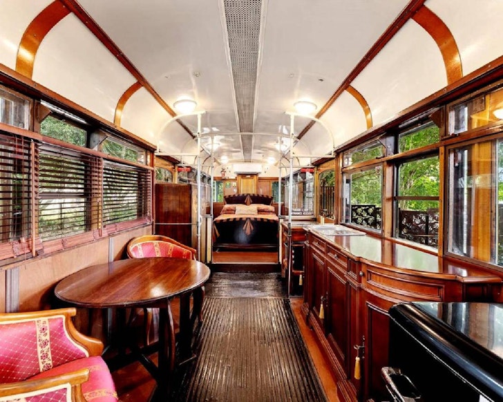 The Art Deco interior of the Rosecliffe Melbourne Tram one of the best farm stays near Brisbane