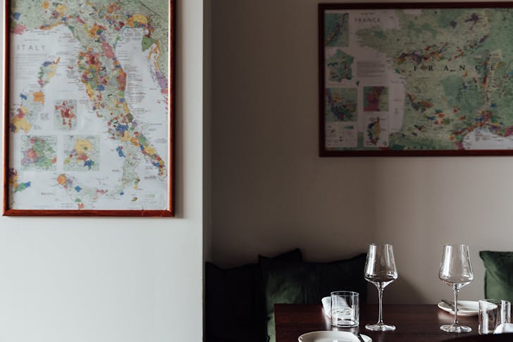 a table below framed maps