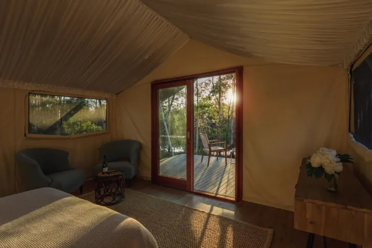 The interior of a tent at Sanctuary By Sirromet one of the best glamping spots in Queensland