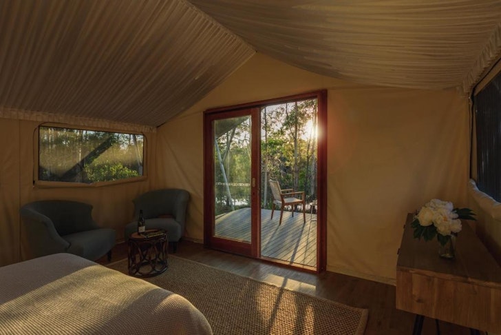 The interior of a tent at Sanctuary By Sirromet one of the best glamping spots in Queensland