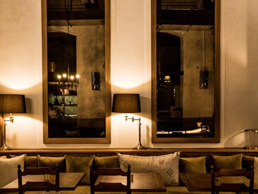 Long mirrors lining the walls at Santa Catarina mezcal bar in Sydney. 