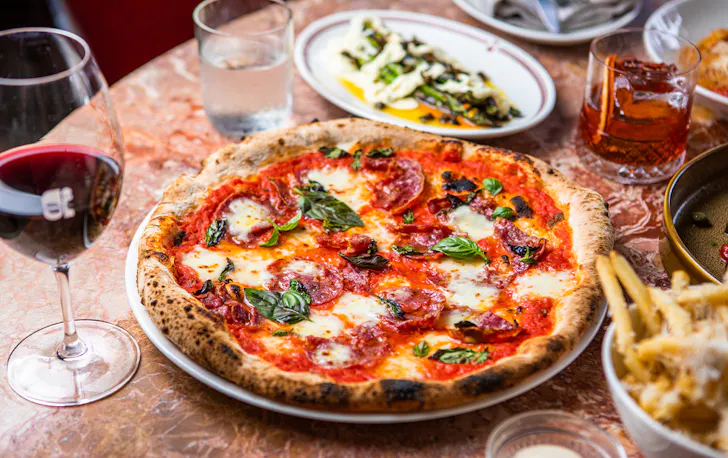 pizza on a table of food