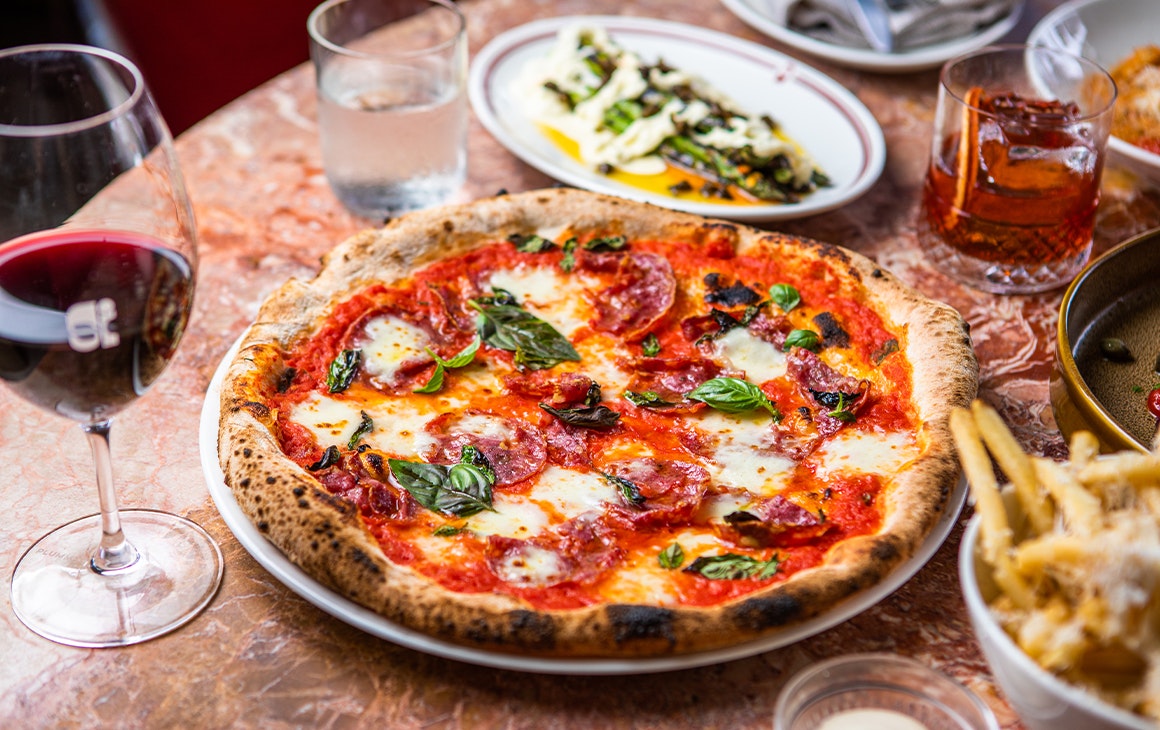 pizza on a table of food