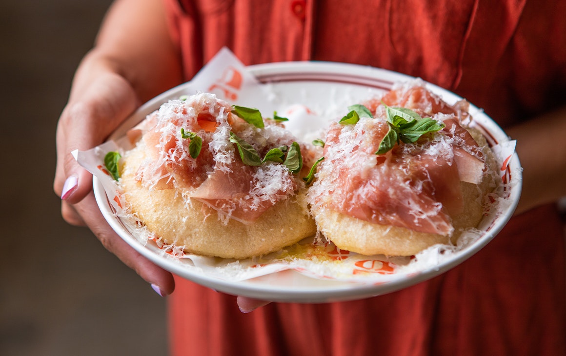 prosciutto atop fried bread