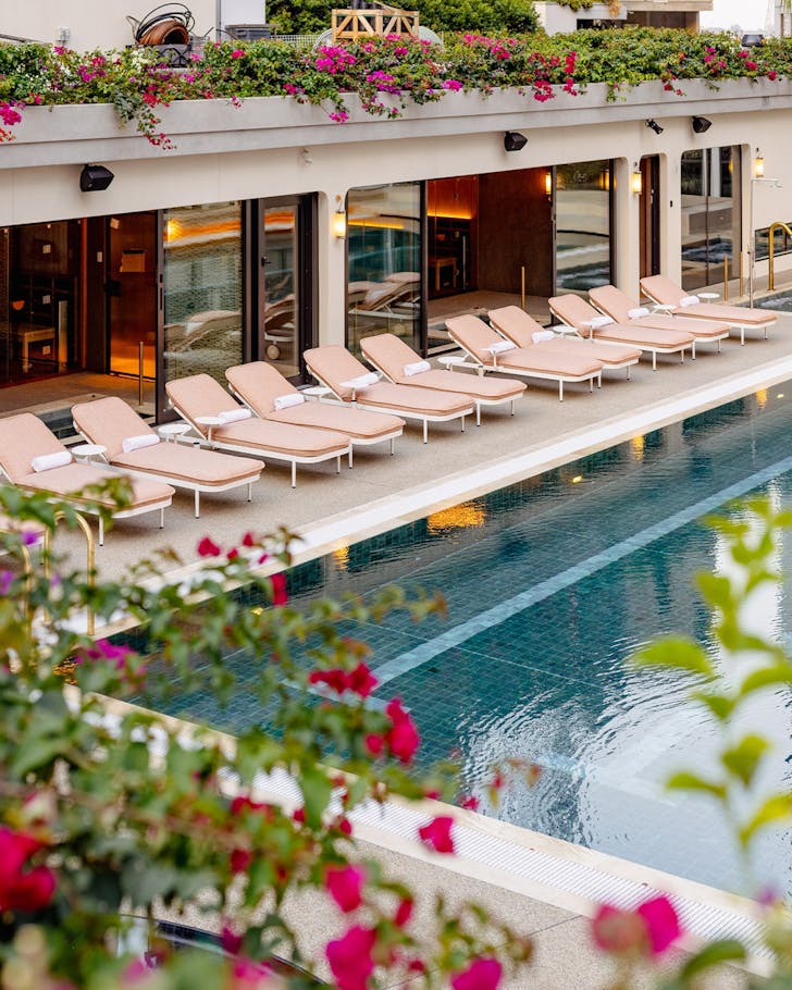 saunas lining a rooftop pool at total fusion in brisbane